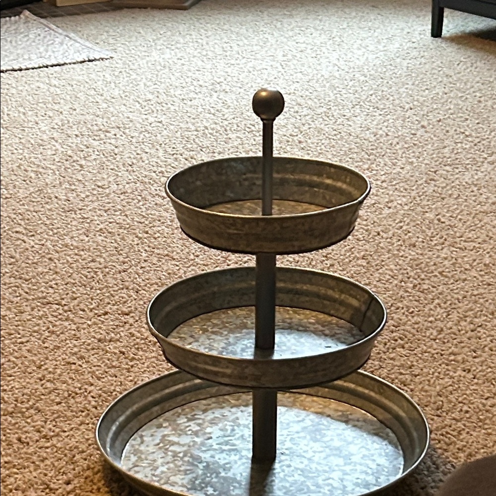 A galvanized pottery barn tiered stand